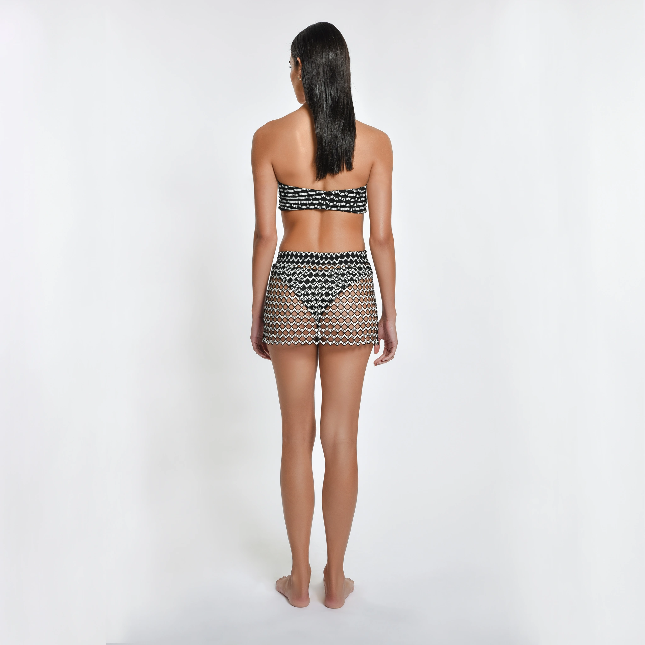 Zuri Mini: Un tocco di estate! Gonna corta, stile senza tempo, perfetta per serate indimenticabili. Eleganza e leggerezza.